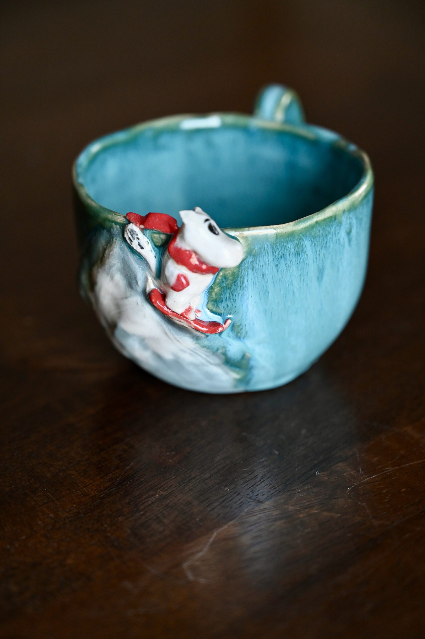 Kubek „Zjazd Muminka” - obrazek 2